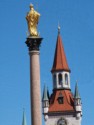 Gold Virgin Mary and the Old City Hall bell tower