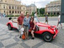 Pete, June, and Jessica next to our touring car