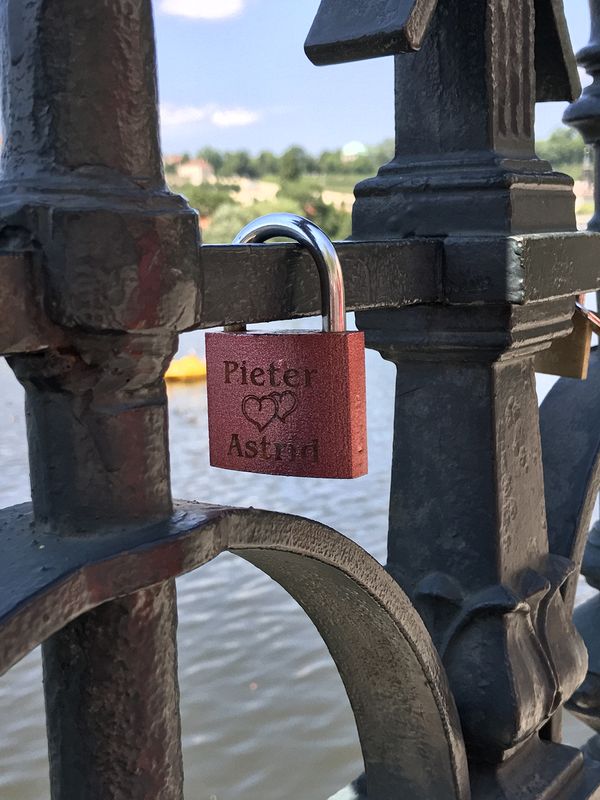 Pieter and Astrid profess their love with a lock on a railing