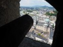 A cannon points across the city