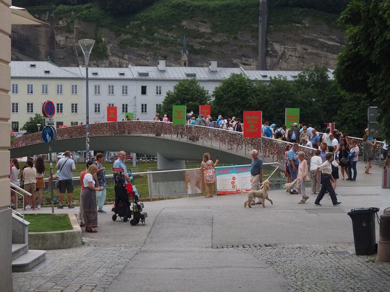 A footbridge covered with locks