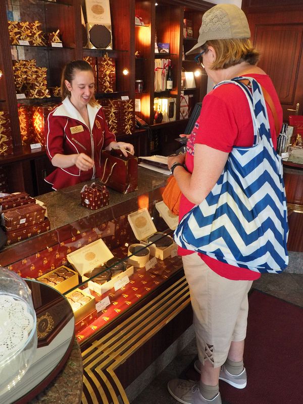 June buys some small sacher torte to eat