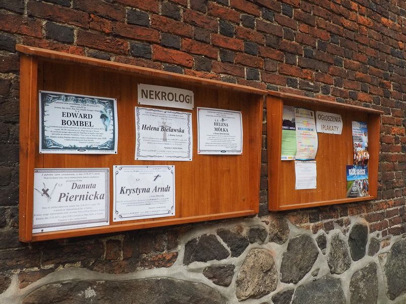 Obituaries posted on front of the church