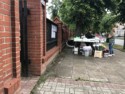 People selling candles and flowers for the graves