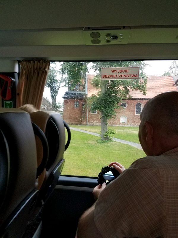 Pete taking photos out the bus window