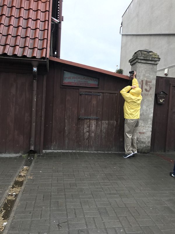 Pete trying to take a photo of the back yard in the rain