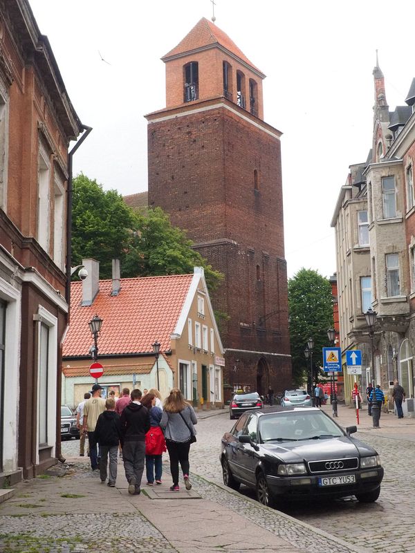 Walking to the entrance to the Church of the Holy Cross