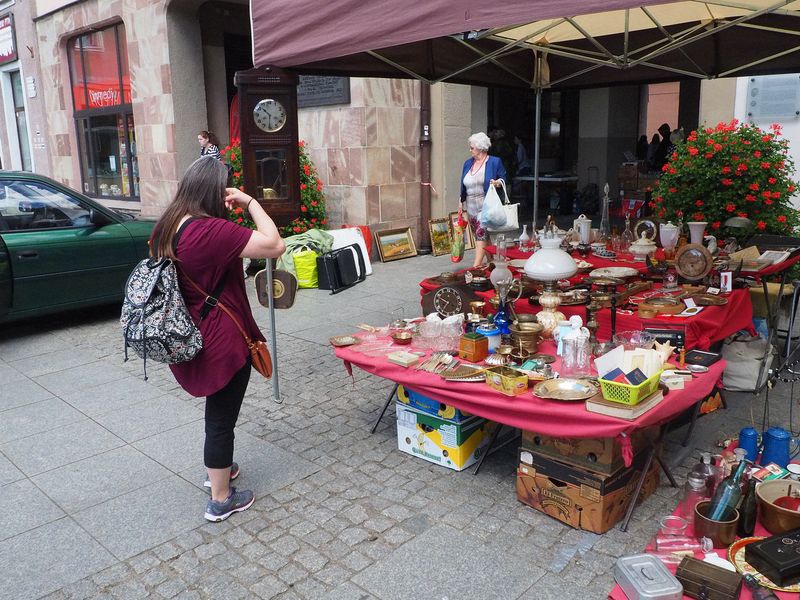 Jessica eyes the flea market offerings