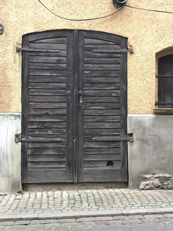 Old door seems to have a mouse hole