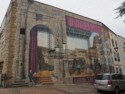 A huge mural on the side of a building showing Vienne's history