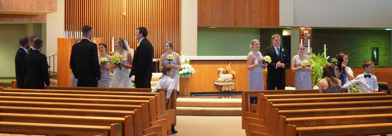 The wedding party waiting to take pictures