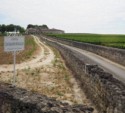 Stone walls line the driveway to Chateau Les Grandes Murailles