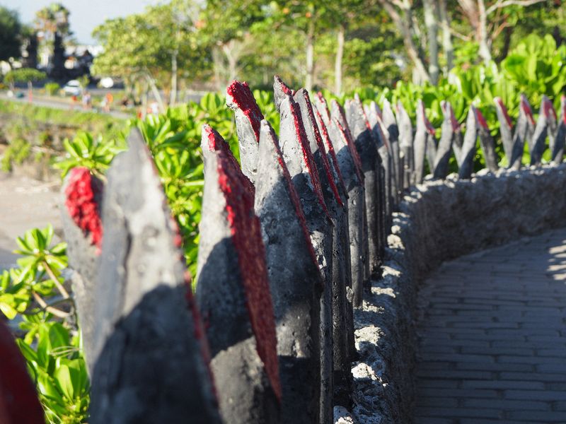 Spikes in a stone wall