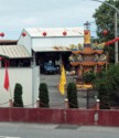 Little shrine in front of an auto repair garage