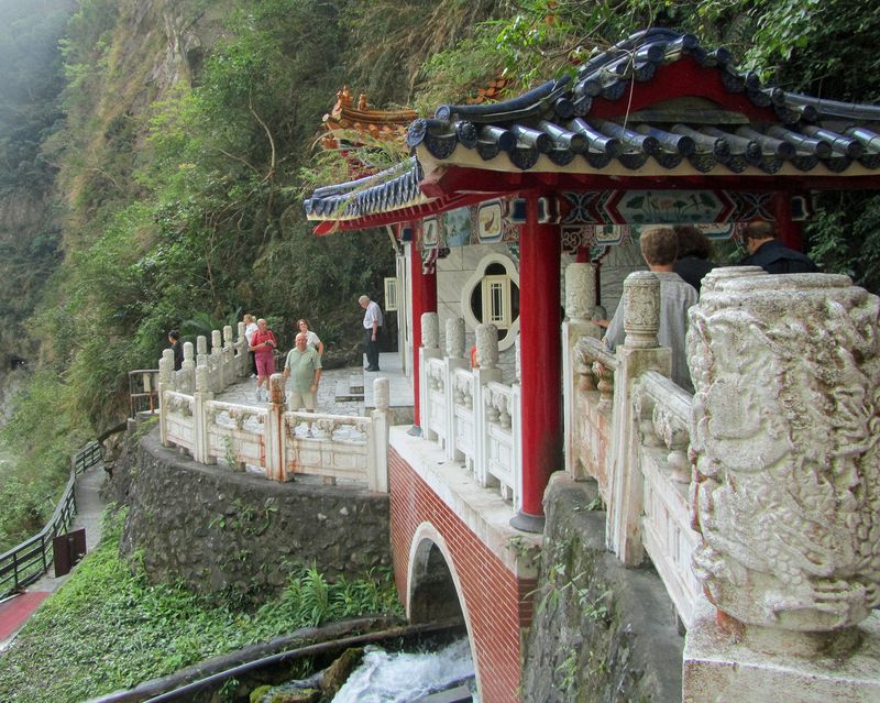 Pete stands at the other end of the shrine