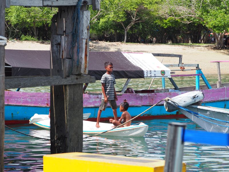 Kids playing in a boat