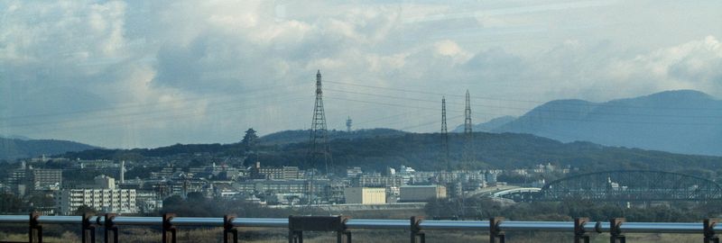 A castle on the distant hills on the way to Kyoto