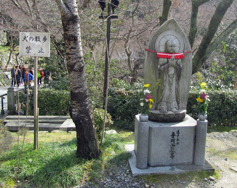 Jizo with flowers