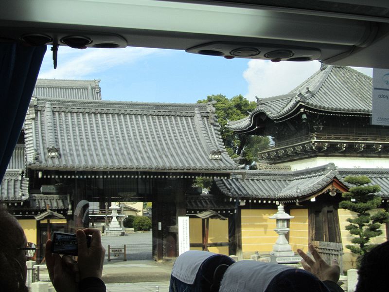 Taking pictures of temples from the bus