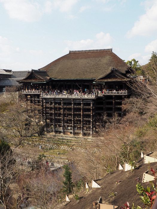 A view of the temple with its wood beam foundation