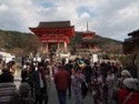 Crowds at the Deva and West gates to the temple dating from 778