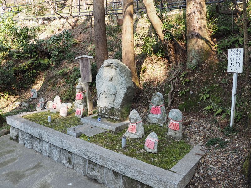 Jizu stones with bibs to protect against evil spirits