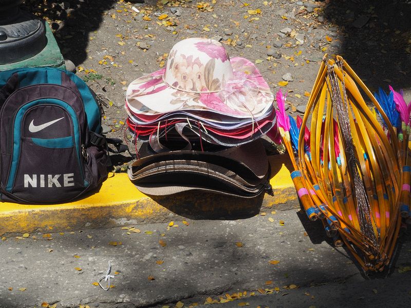 Hats and bows and arrows for sale to tourists