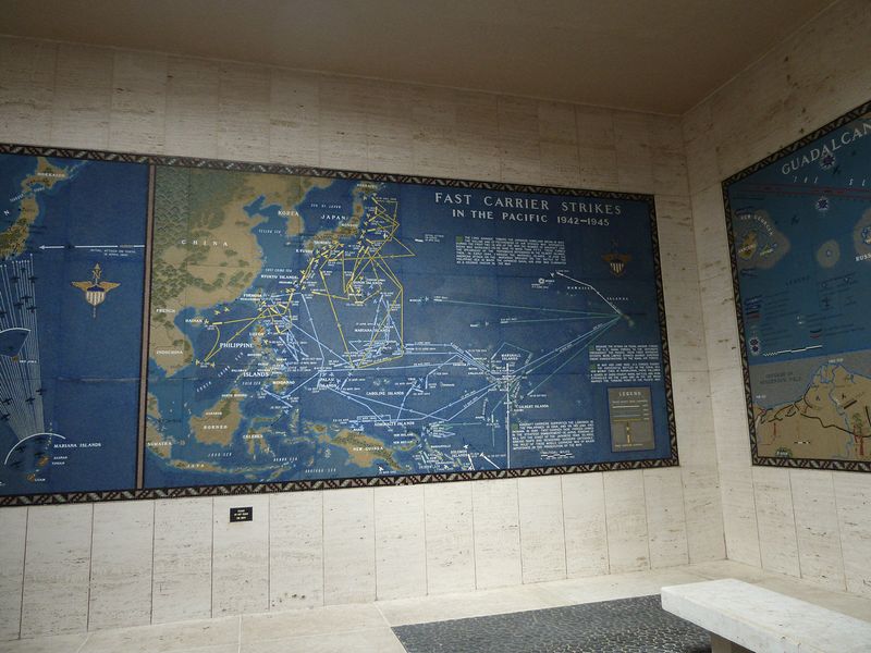 Maps on the wall show the history of the war