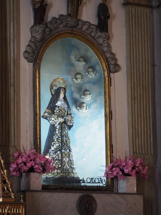 Saint Rita holding a skull