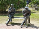 Statues of Quezon giving advice to MacArthur