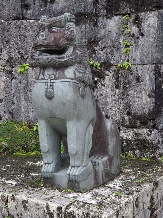 A lion guards the gate