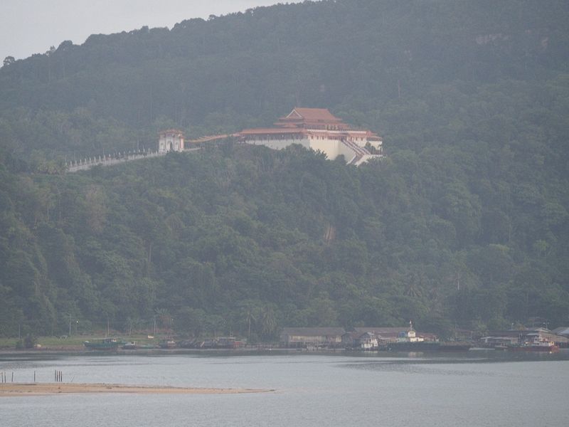 A temple on a hill in the distance