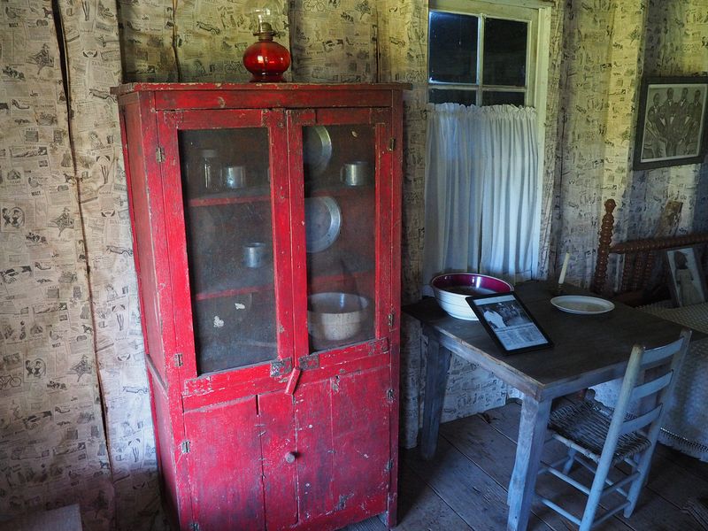 Cupboard with newspaper for wallpaper