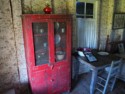 Cupboard with newspaper for wallpaper