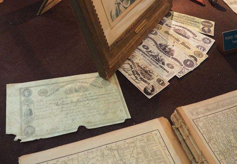 Stock certificate and Confederate money