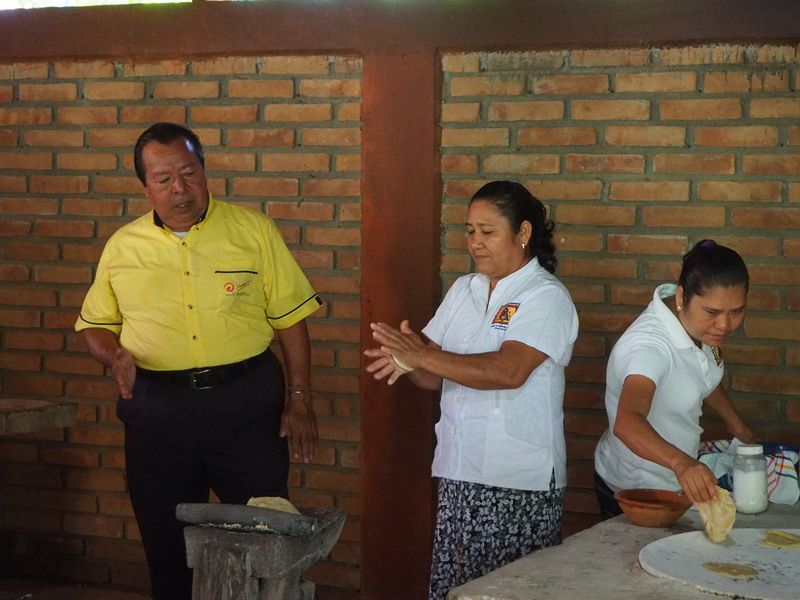 Making tortillas from the masa