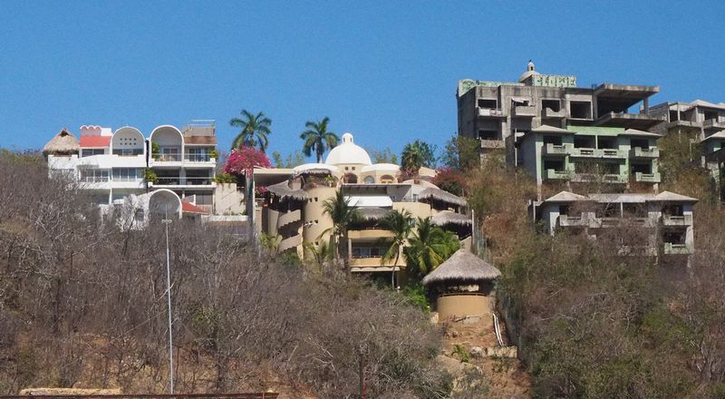 Multi-story houses in various states of repair