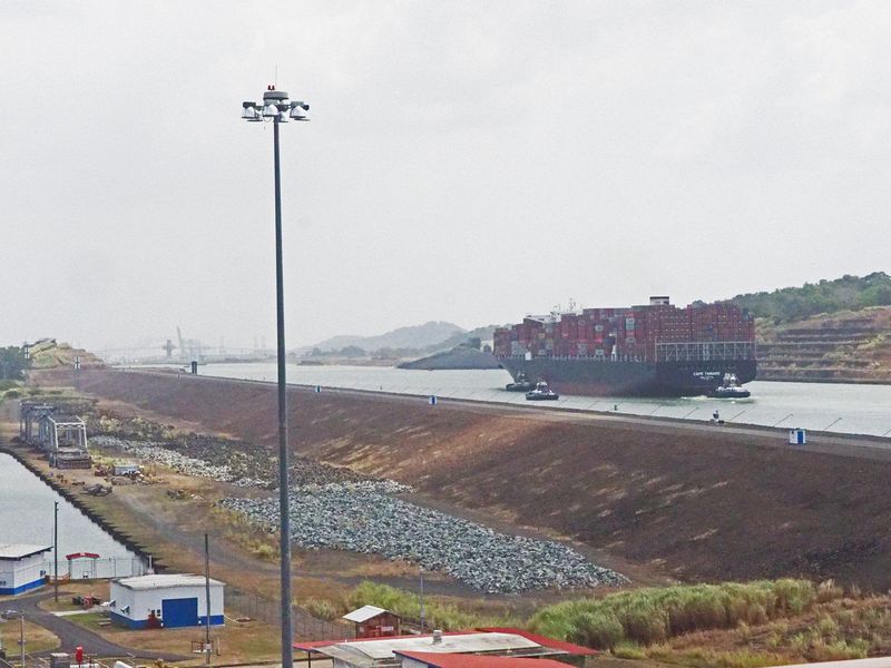 A large cargo ship uses the new Canal that opened in 2016