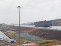 A large cargo ship uses the new Canal that opened in 2016