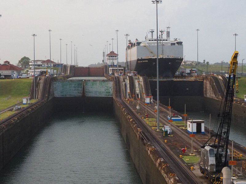 There is a huge cargo ship in the locks next to us