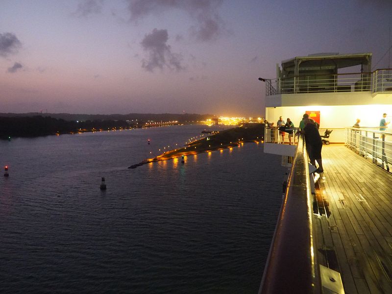 We approach the locks of the Panama Canal at dawn