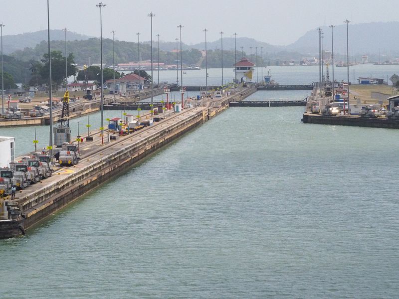 We approach the Miraflores locks to go down one level