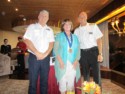 Colleen gets a medal from Holland America