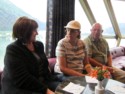 Colleen, June, and Pete in a lounge on the ship