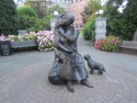 Statue of Emily Carr with a monkey on her shoulder