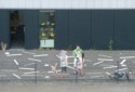 A little boy waves to our ship