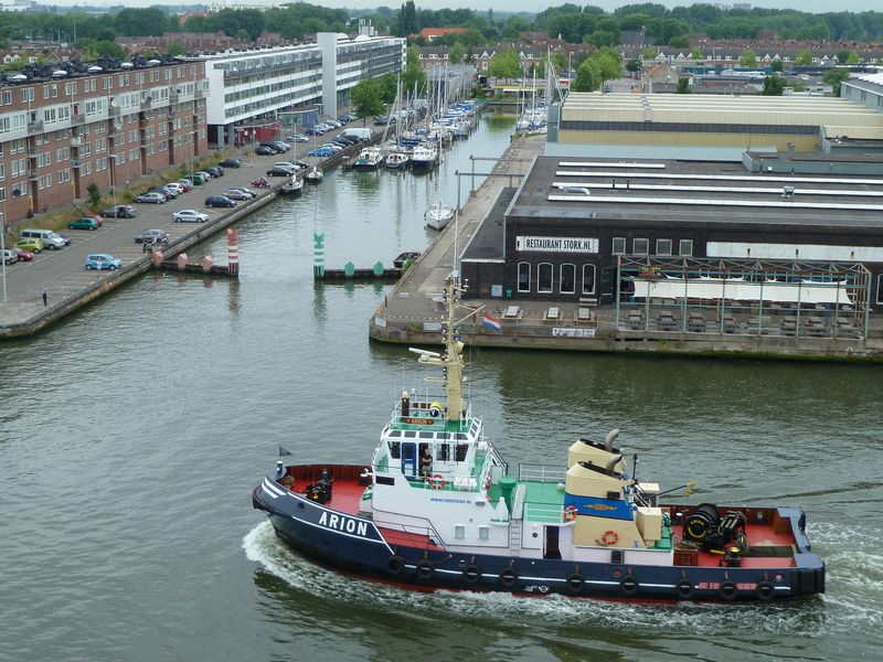 A tug boat goes by