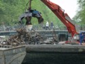 Dredging up bicycles thrown into the canal