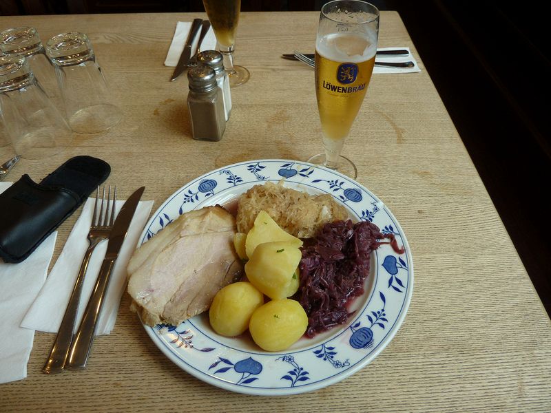 Pork roast, potatoes, saurkraut, and beer