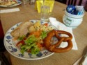 Pork roast, salad, spaetzle, and a pretzel